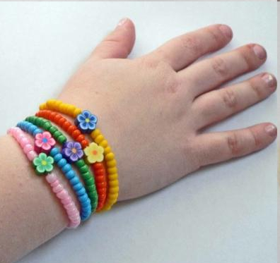little girl with bracelets
